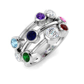 A multi-band family bubble ring in platinum or white gold, set with a colourful mix of diamonds and multi-gemstones, on a white background.